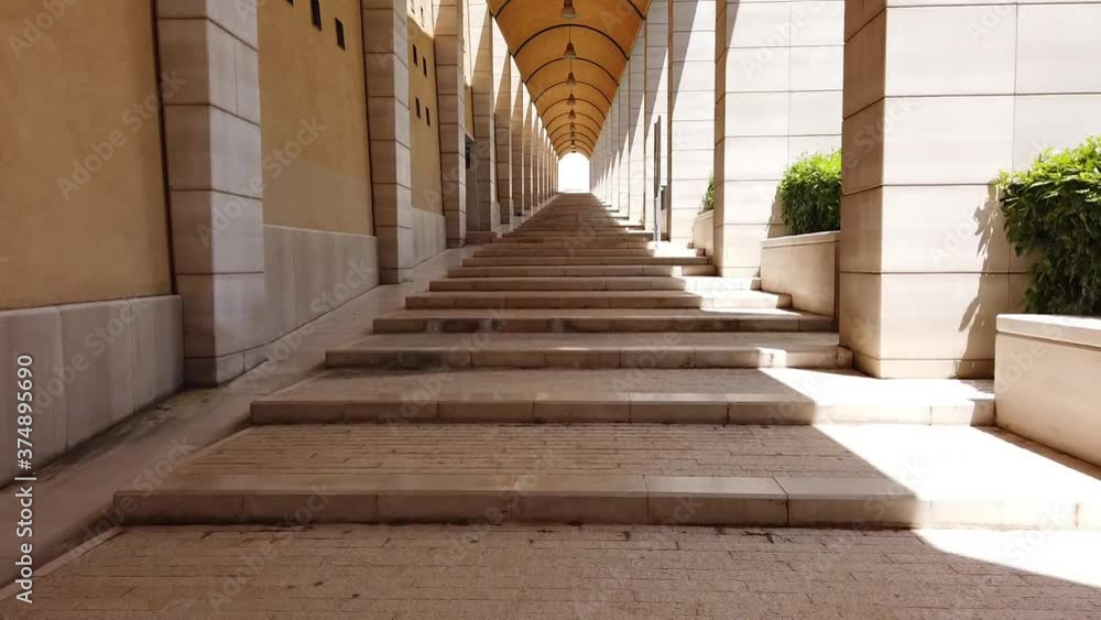 fast walking under the arcades on long archway corridor hyperlapse in San Giovanni Rotondo - Apulia - Italy fast walking under the arcades on long archway corridor hyperlapse in San Giovanni Rotondo - Apulia - Italy