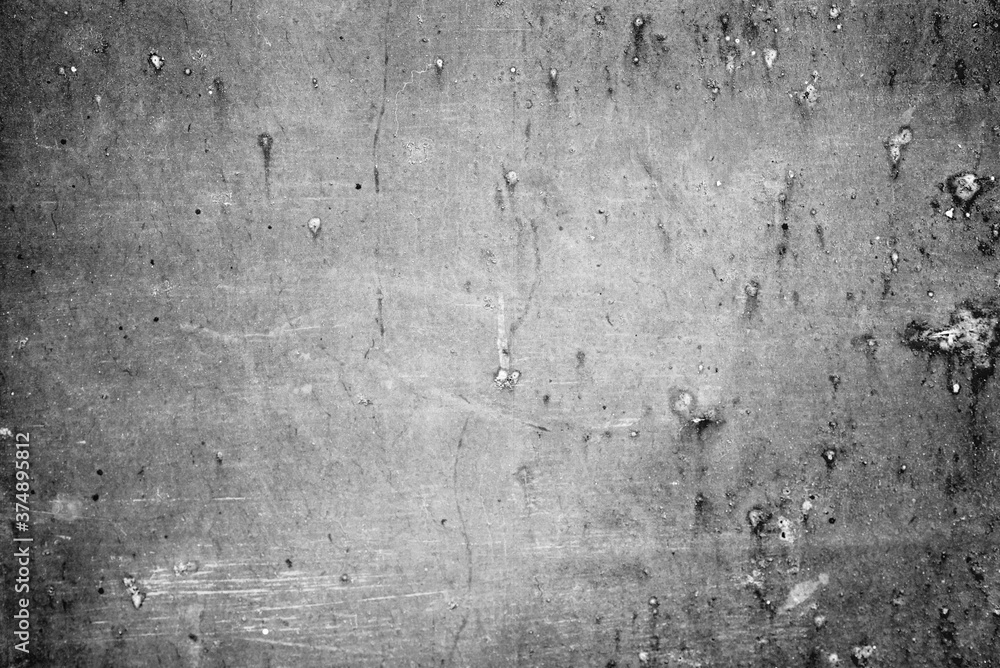 Metal texture with scratches and cracks which can be used as a background Metal texture with scratches and cracks which can be used as a background