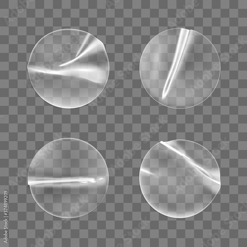 Transparent round adhesive stickers mock up set isolated on transparent background. Plastic crumpled round sticky label with glued effect. Template of a label or price tags. 3d realistic vector mockup