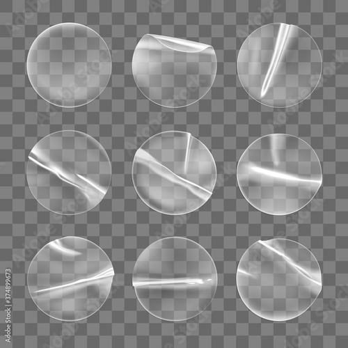 Transparent round adhesive stickers mock up set isolated on transparent background. Plastic crumpled round sticky label with glued effect. Template of a label or price tags. 3d realistic vector mockup