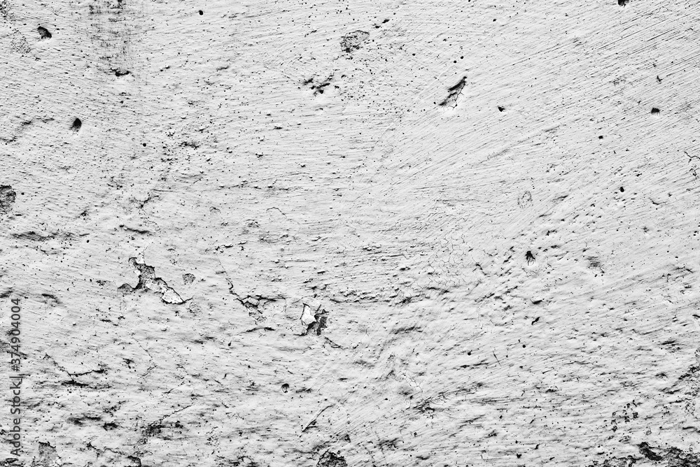 Texture of a concrete wall with cracks and scratches which can be used as a background Texture of a concrete wall with cracks and scratches which can be used as a background