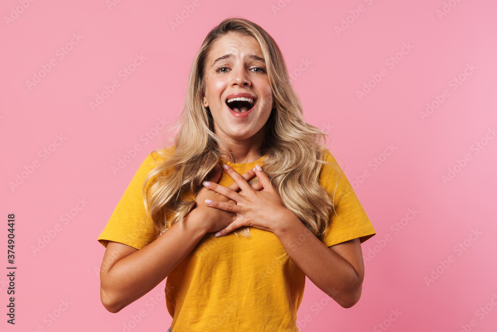 Image of shocked blonde girl expressing surprise at camera Image of shocked blonde girl expressing surprise at camera