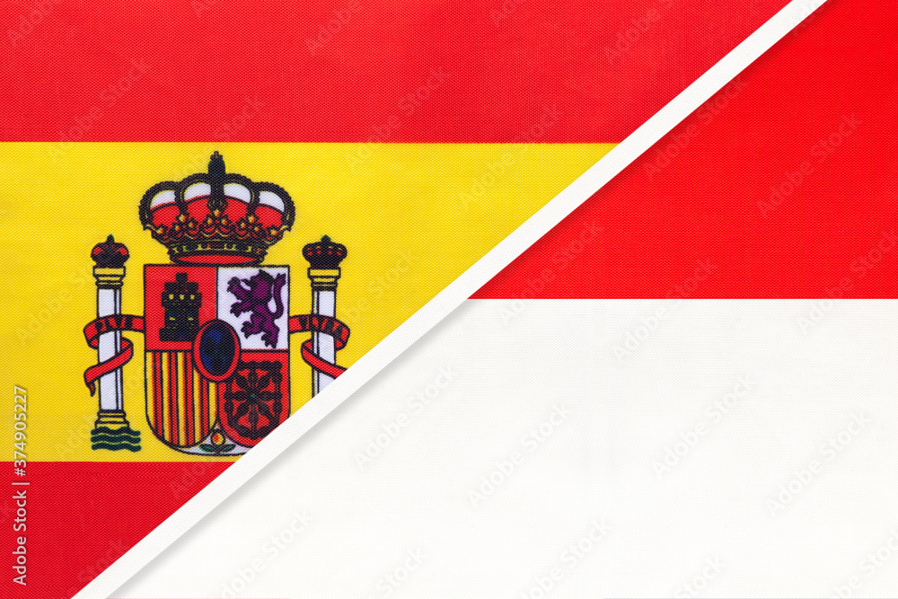 Spain and Indonesia, symbol of two national flags from textile. Partnership between European and Asian countries. Spain and Indonesia, symbol of two national flags from textile. Partnership between European and Asian countries.