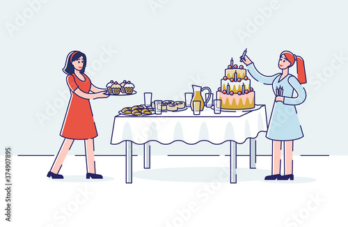 Birthday celebration preparation with two women serving holiday sweet table - big cake and cupcakes