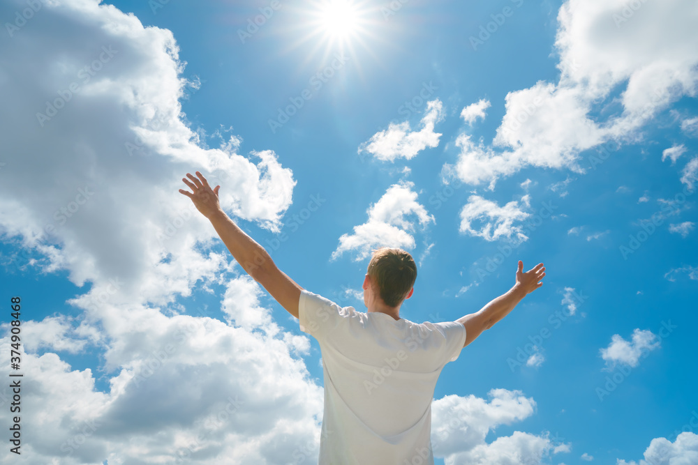 Man strive hands to the deep blue sky and sun Man strive hands to the deep blue sky and sun