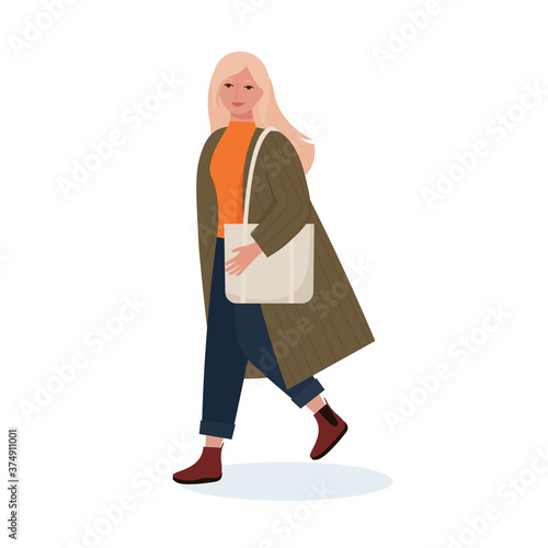 Fashionable young woman in a coat, boots with a bag. Autumn street style clothes. Vector illustration in cartoon flat style