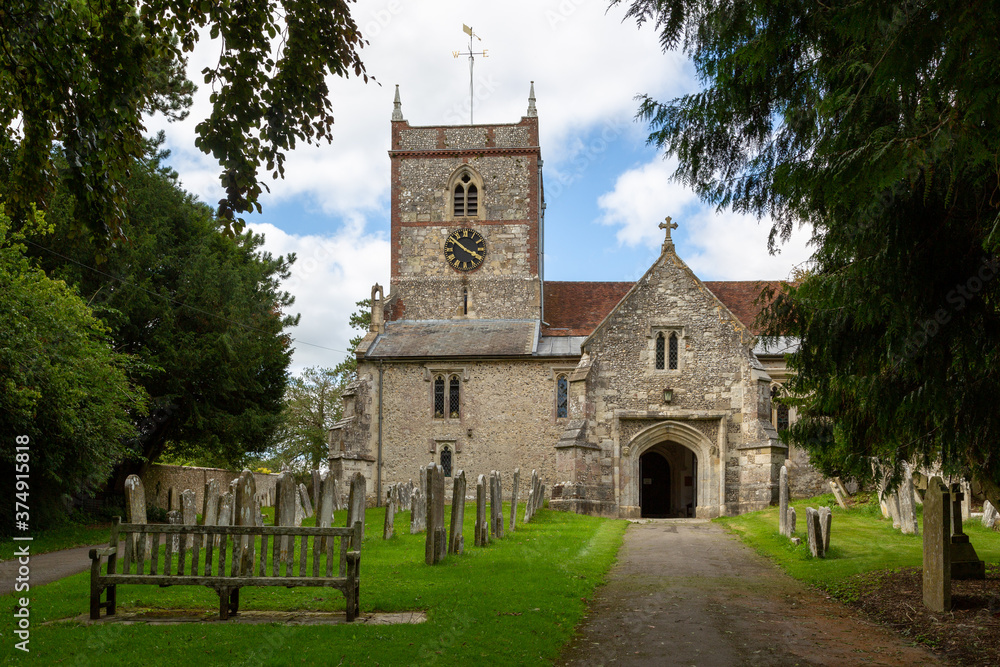 The exterior of the church St Peter and St Paul in Hambledon Hampshire, A typical English church The exterior of the church St Peter and St Paul in Hambledon Hampshire, A typical English church