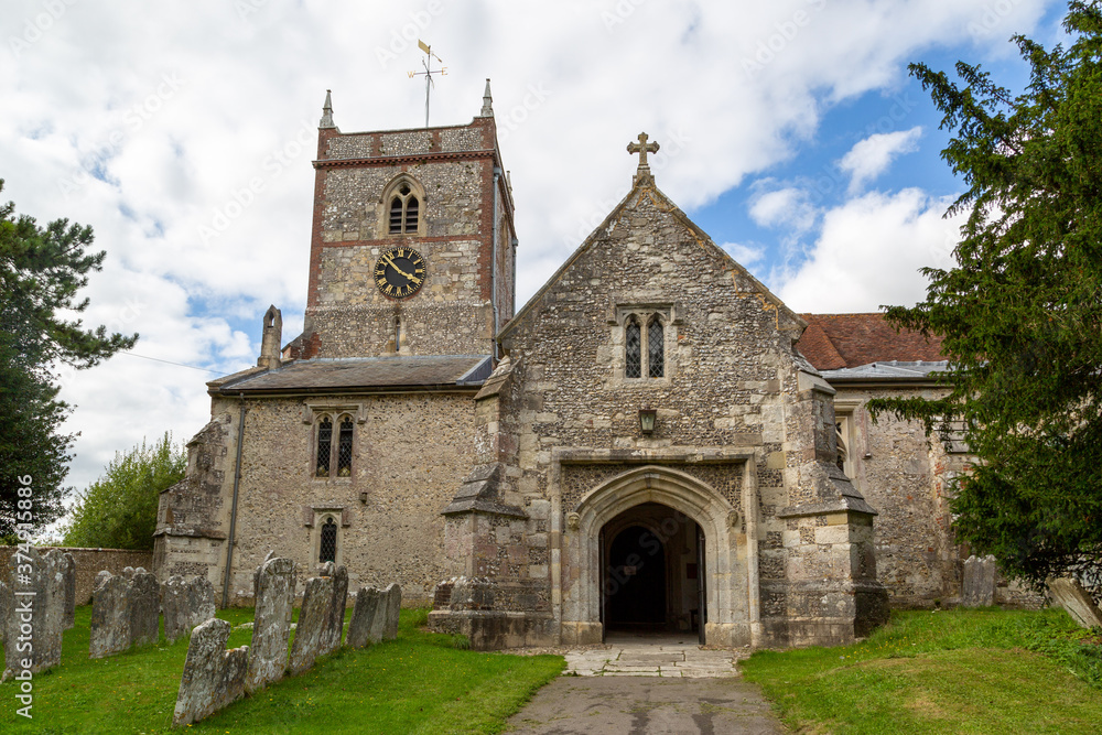 The exterior of the church St Peter and St Paul in Hambledon Hampshire, A typical English church