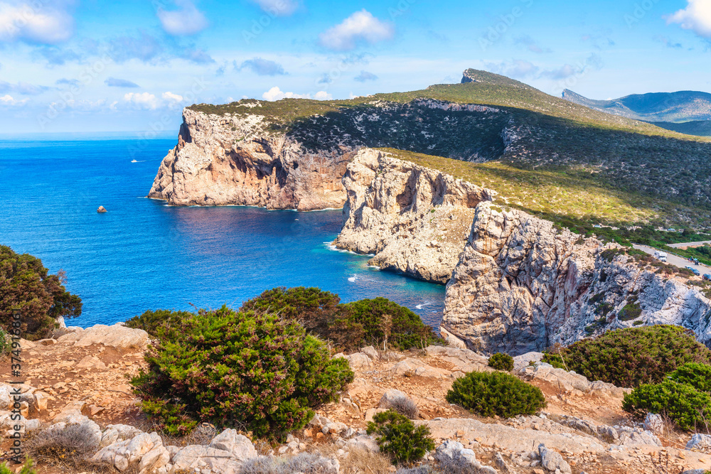Hunting Cape, cliffs and blue sea. Sardinia, Italy