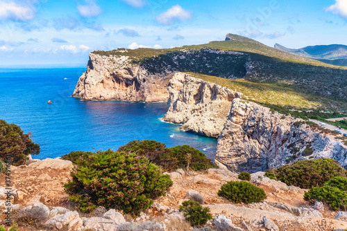Hunting Cape, cliffs and blue sea. Sardinia, Italy