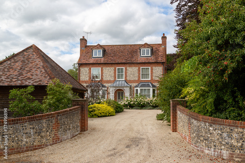 The driveway leading to an expensive country home