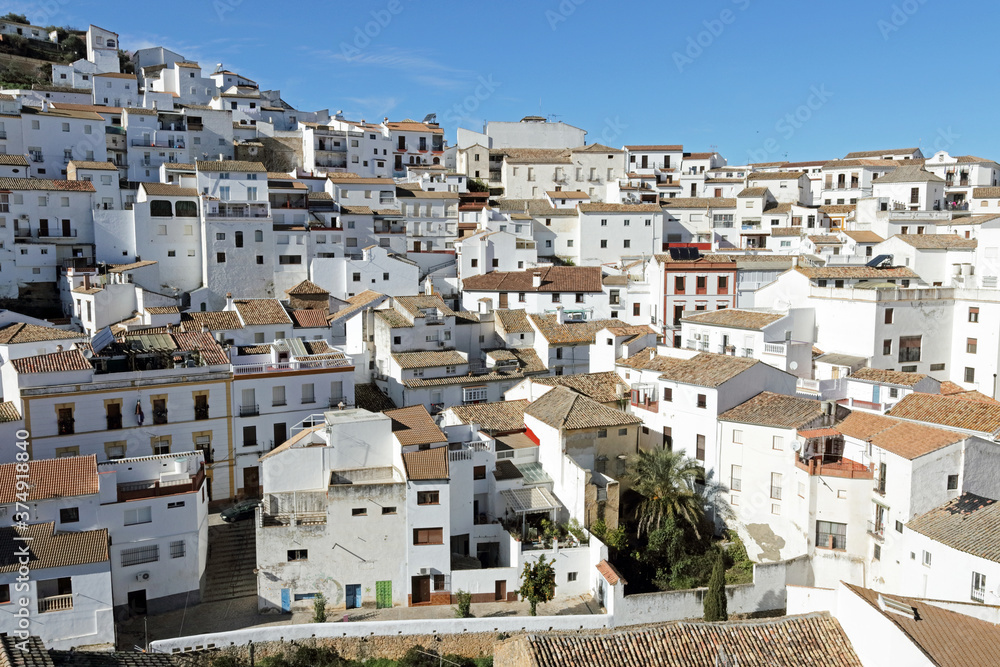 Setenil de las Bodegas, a white Andalucian village (Spain)  with cave houses against and under the rocks 