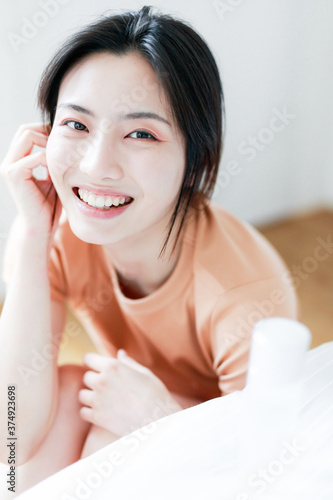 Asian women with skin lotion