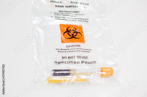 Health care blood specimen pouch blood bank laboratory blood work sample, orange biohazard sign resealable plastic bag