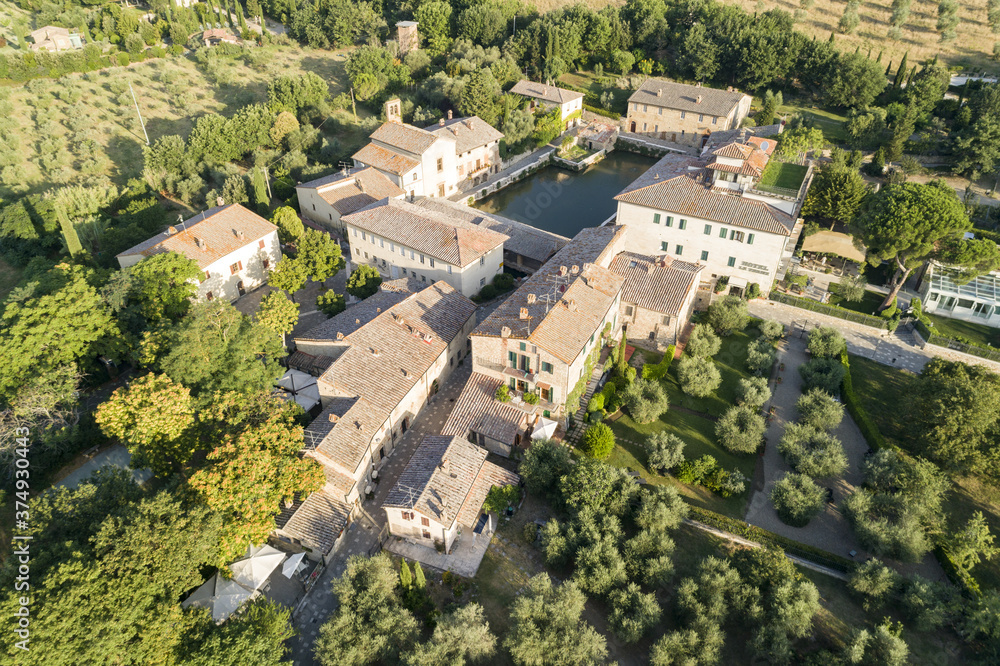 Aerial view of Bagno Vignoni a village in Val D'orcia. Spas, nature and a beautiful landscape