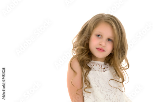 Portrait of a little girl close-up.Isolated on white background. © lotosfoto