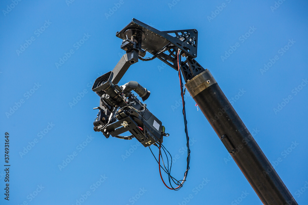 Professional camera moving a film, making a movie Professional camera moving a film, making a movie