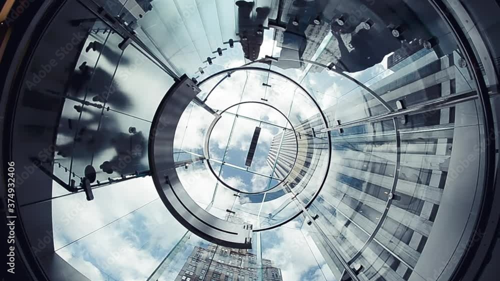 People steps, upward view of a modern staircase. Slow motion.