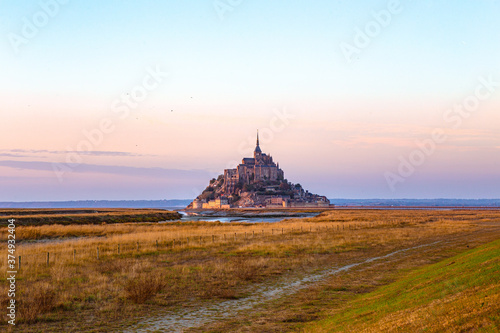 Wallpaper Mural Mont-Saint-Michel and its Bay at sunset, in Normandy, France. Torontodigital.ca