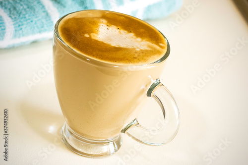 A coffe in a glass cup
