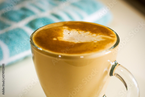 A coffe in a glass cup