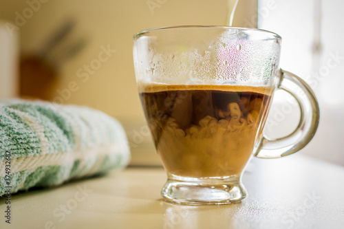 A coffe in a glass cup