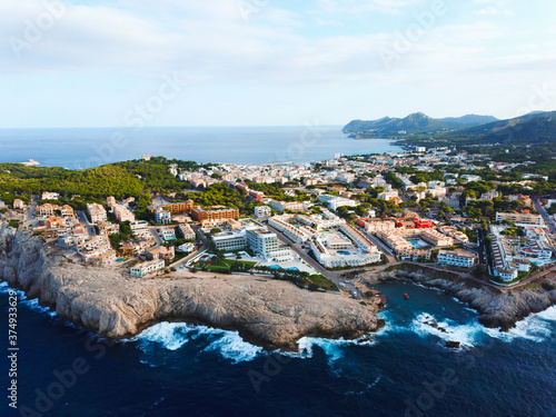 Aerial view of touristic apartments and hotels in Cala Agulla in Majorca, Spain photo