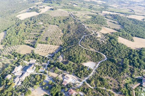 Aerial view of the sunrise in the valley of the orc, the sun just arose, the countryside in Tuscany