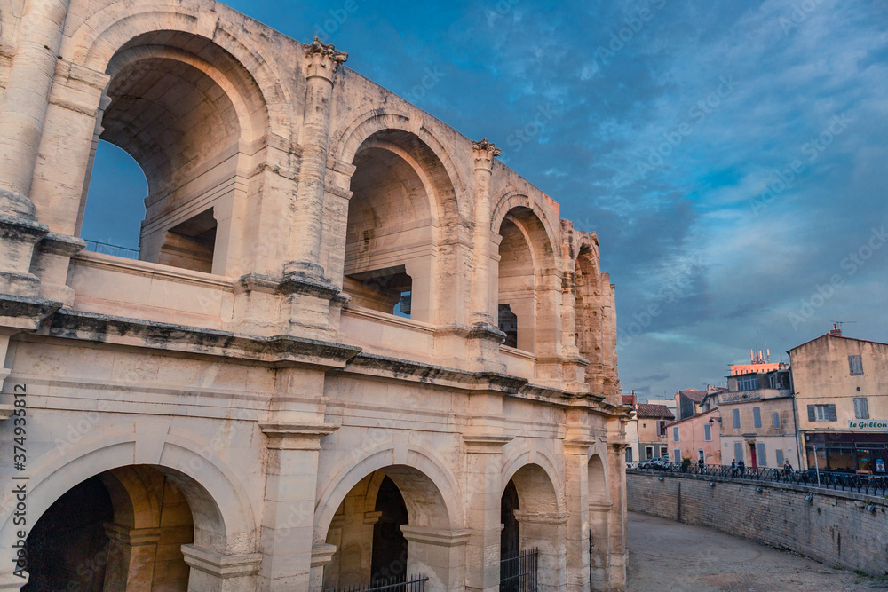 The ancient roman ruins in Arles, Provence, at sunset.