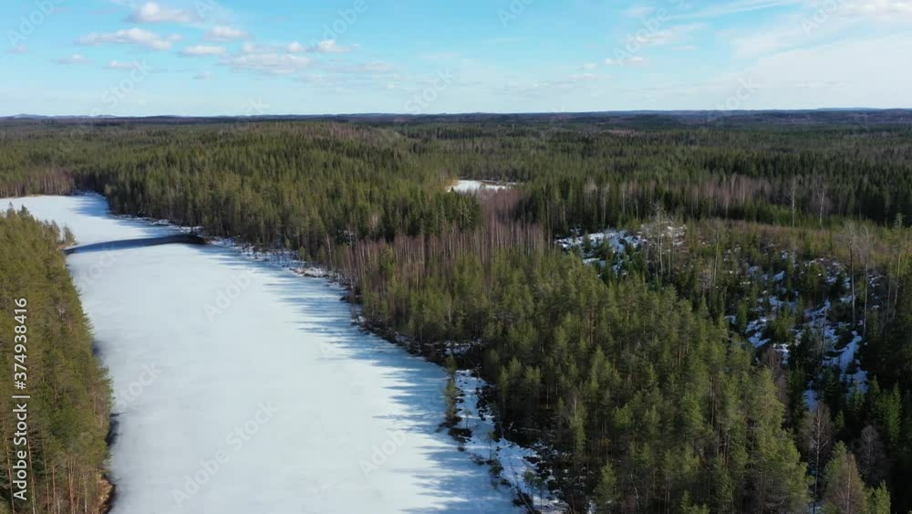 Aerial view of ice-covered Kallio lake in Finland. North-Karelia nature. Aerial view of ice-covered Kallio lake in Finland. North-Karelia nature.