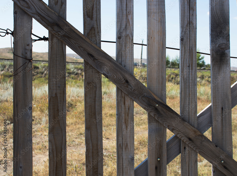 Wooden fence protect railway from snow. Wooden fence. Wooden fence protect railway from snow. Wooden fence.