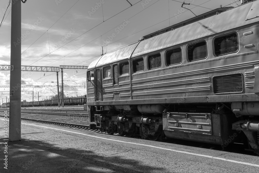 Fototapeta premium Locomotive at the railway station black and white photo
