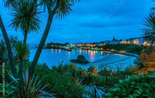 A view across Tenby Harbour from the North Cliff Gardens at sunrise in Autumn