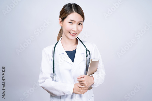Asian female doctor isolated on white background  Concept of medical and health care.