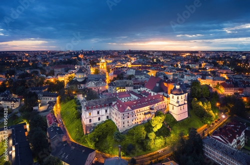 Lublin, Poland. Aerial view of Old Town at dusk with historic Dominican Abbey on foreground photo