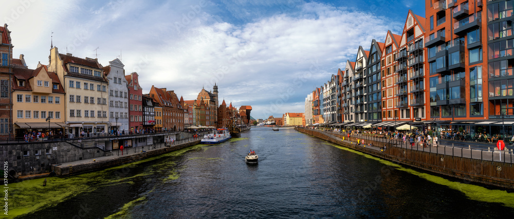 The Old Town of Gdańsk with the rebuilt Wyspa Spichrzow on the right. Poland. The photo was taken on August 20, 2020