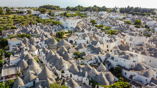 Aerial view of the Trulli of Albarobello in the south of Italy - Traditional Apulian dry stone huts with a conical roof specific to the Itria Valley, in the Murge area of the Italian region of Apulia