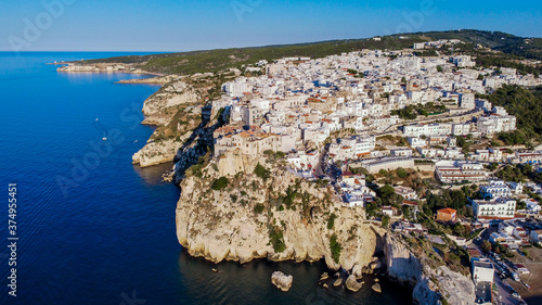 Aerial view of the coast east of Peschici on the Gargano peninsula in Italy - Village built on a rocky overlook in the Adriatic Sea