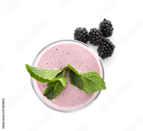 Tasty milk shake with blackberries and mint isolated on white