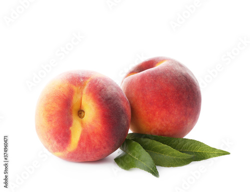 Wallpaper Mural Delicious ripe juicy peaches with leaves isolated on white Torontodigital.ca