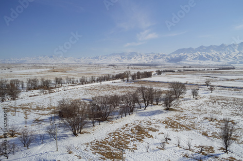 Mountain Range and Steppe Landscape seen from Top of Burana Tower near Tokmok, Kyrgyzstan