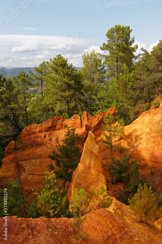 Former Roussillon Ochre quarry in the south of France. Magnificent red and orange hills 