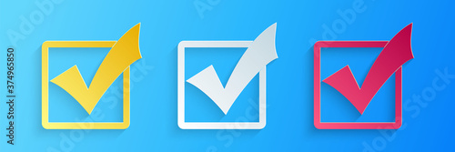 Paper cut Check mark in a box icon isolated on blue background. Tick symbol. Check list button sign. Paper art style. Vector.