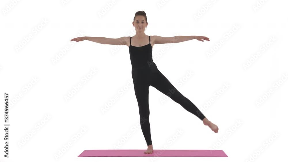 Pregnant Caucasian woman doing standing side leg raises. Exercises for balance and strength. Isolated on white background Pregnant Caucasian woman doing standing side leg raises. Exercises for balance and strength. Isolated on white background