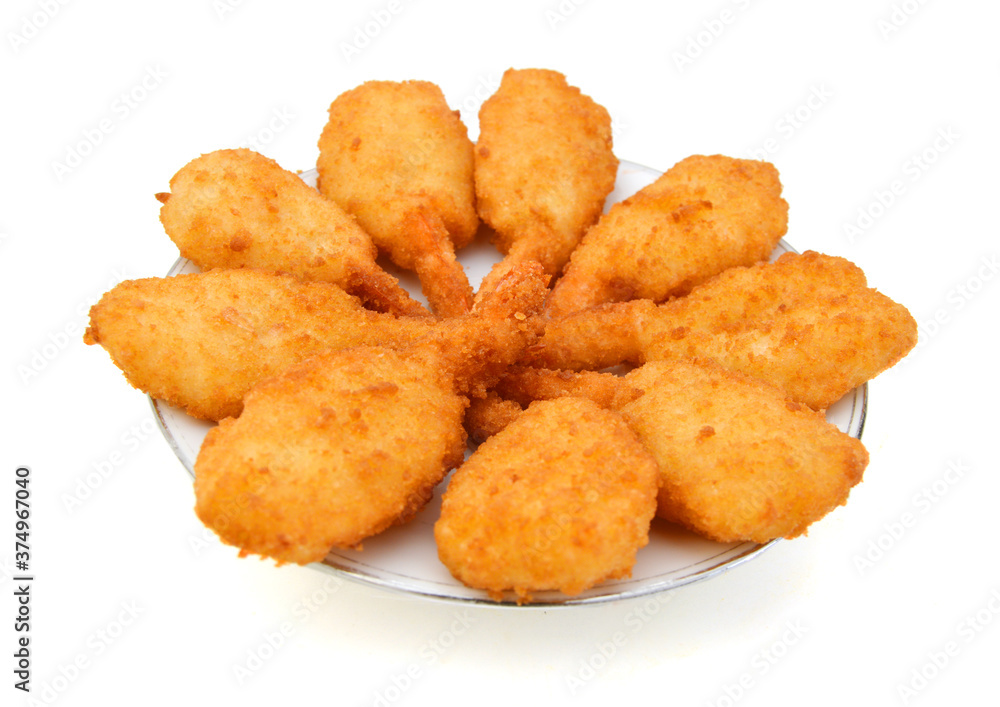 Breaded Butterfly Prawns - Deep fried battered prawns filled in white plate on white background Breaded Butterfly Prawns - Deep fried battered prawns filled in white plate on white background