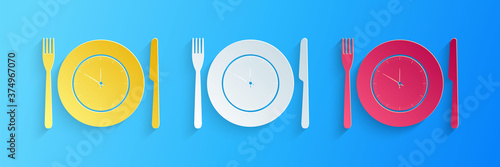 Paper cut Plate with clock, fork and knife icon isolated on blue background. Lunch time. Eating, nutrition regime, meal time and diet concept. Paper art style. Vector.