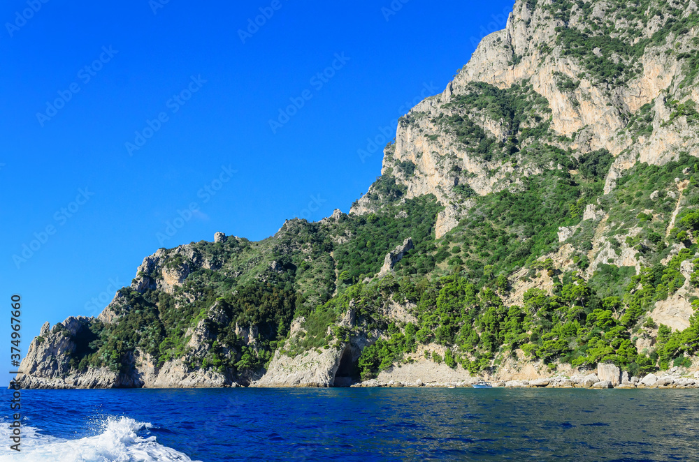 Magnificent landscapes of the island of Capri from the sea.