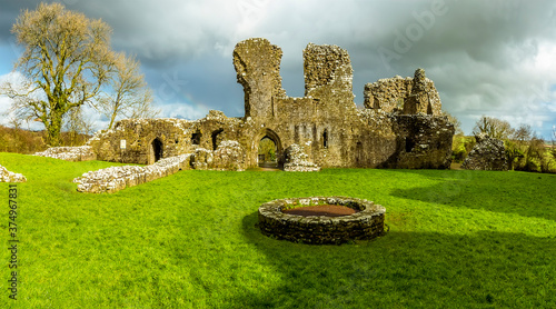 A view of the well and rear hall of the thirteenth-century castle at Llawhaden, Wales photo