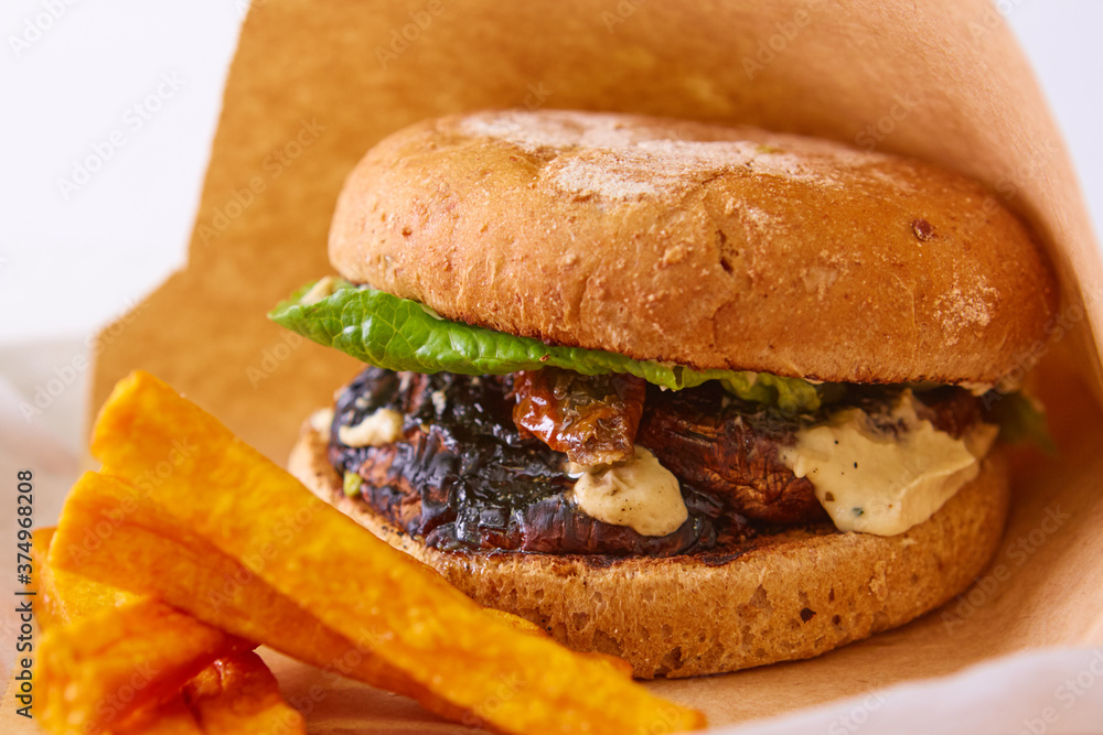 Vegan Homemade Portabello Mushroom Black Bean Burger with Fries Vegan Homemade Portabello Mushroom Black Bean Burger with Fries
