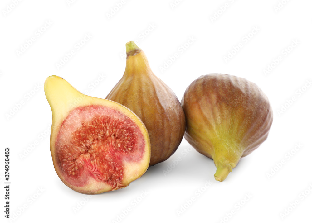 Whole and cut tasty figs isolated on white Whole and cut tasty figs isolated on white